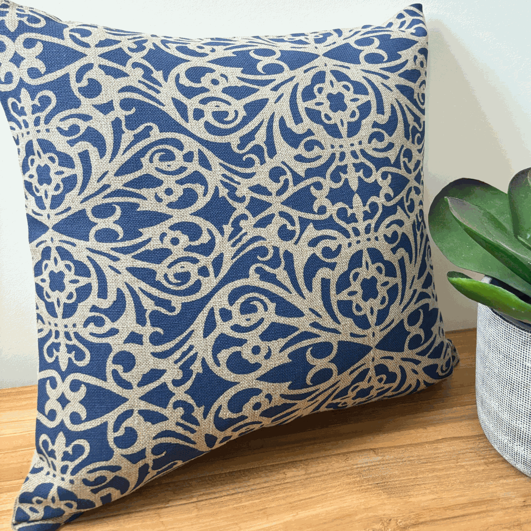 Blue fretwork cushion cover on natural linen with architectural design, 42x42 cm, hand screen-printed, eco-friendly inks