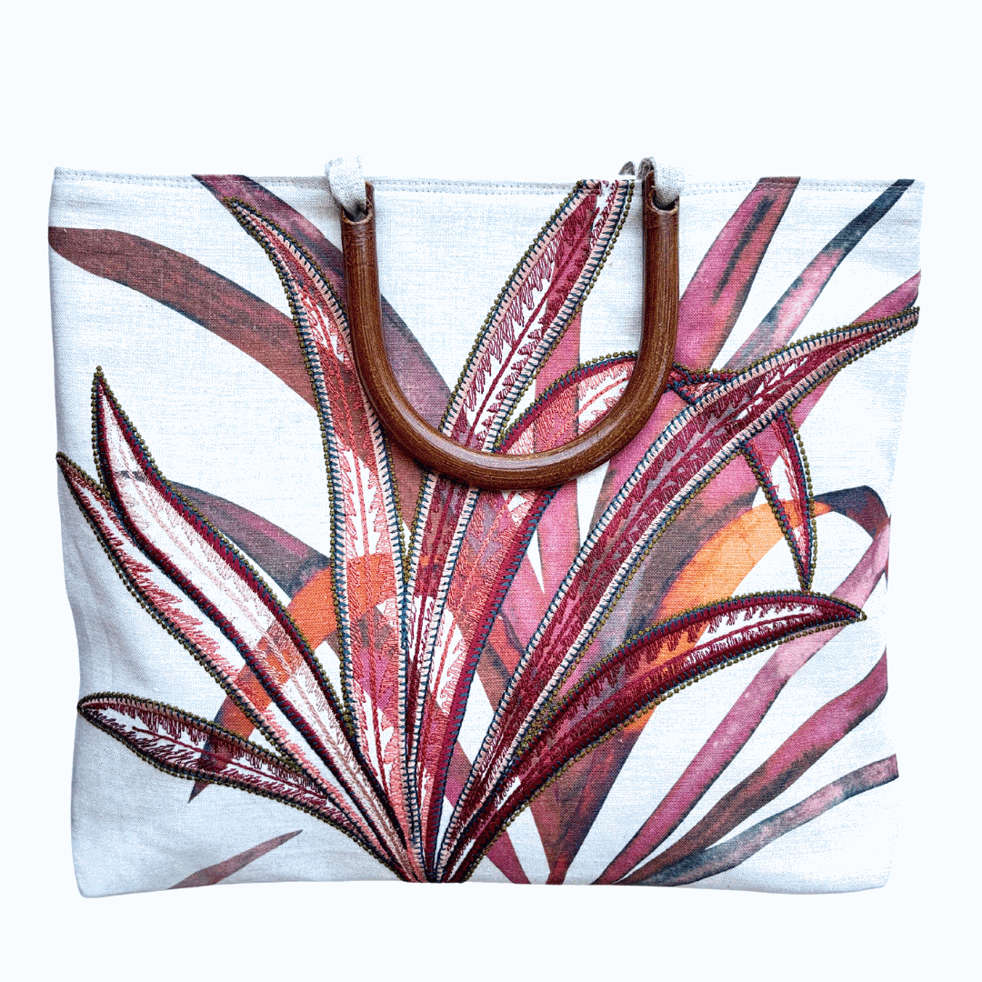 Port Douglas Days large red shopper bag with horseshoe handles and tropical leaf design