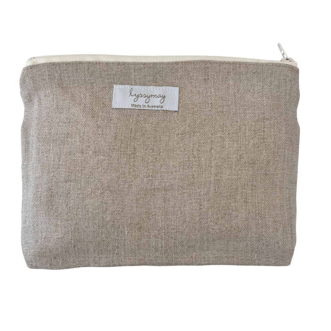Linen zip pouch with a lyssymay brand label on a white background