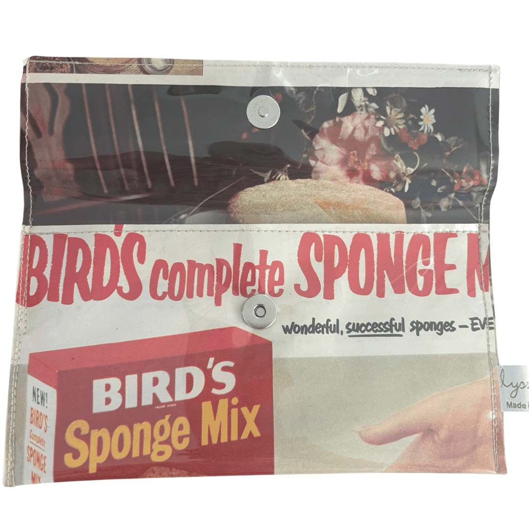Vintage 1950s magazine wallet featuring Bird's Sponge Cake Mix advertisement and magnetic closure