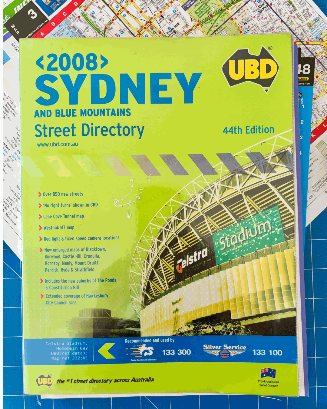 Sydney street directory with stadium illustration on a blue background