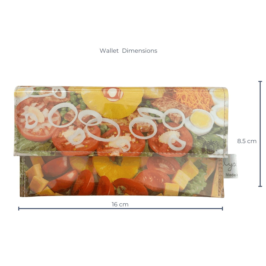 Lyssy May handmade wallet featuring original page from Golden Circle Cookbook from the 1960s. this if the front view showing the salad detail and dimensions of the wallet of 16 cm wide by 8.5 cm high.