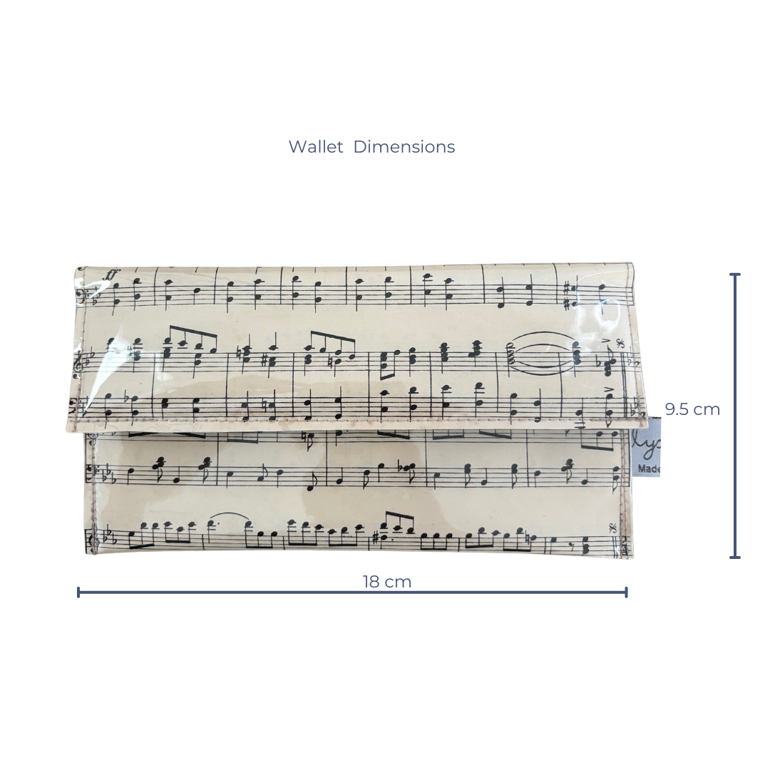 Wallet with music sheet design and dimensions on a white background