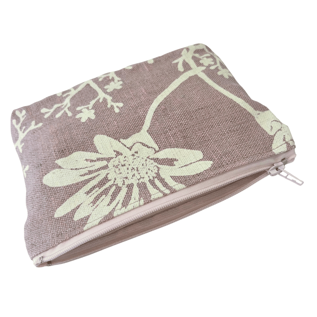 Floral patterned pouch with zipper on a white background