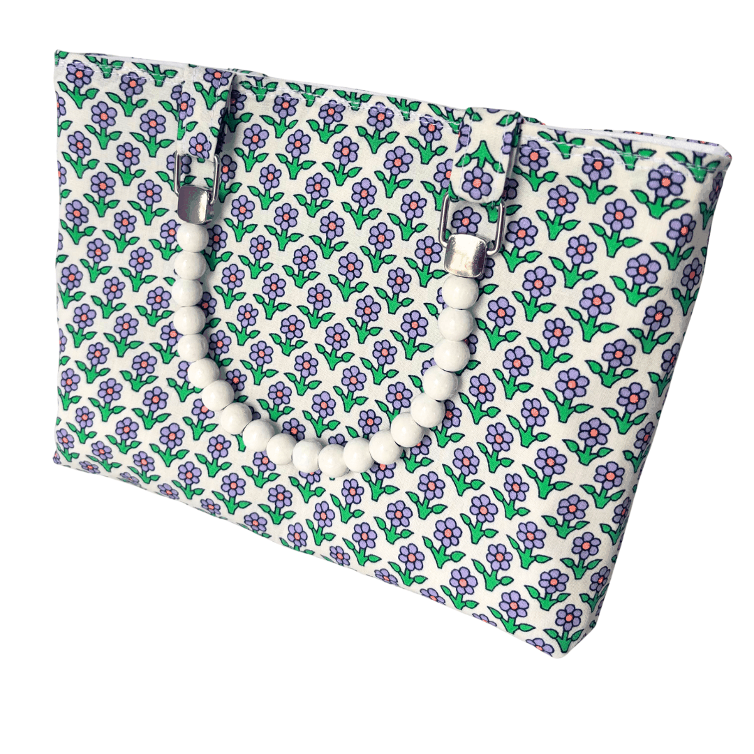 Floral patterned bag on a white background