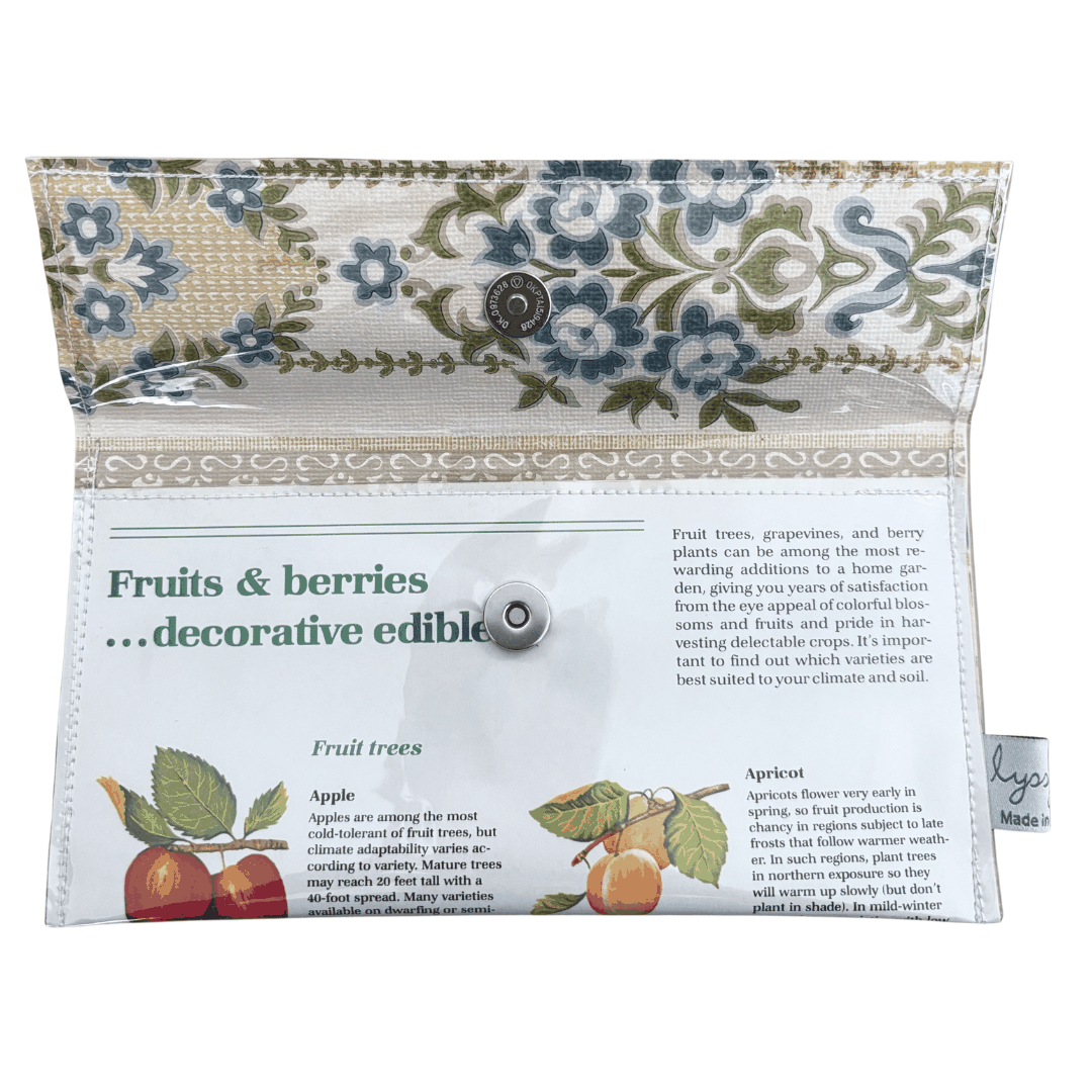 Decorative pouch with floral pattern and educational text on fruits and berries.