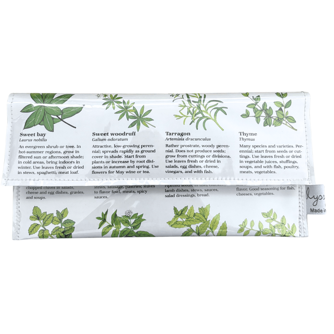 Vintage garden book wallet made from 1981 gardening book pages featuring herb illustrations and lined with vintage wallpaper