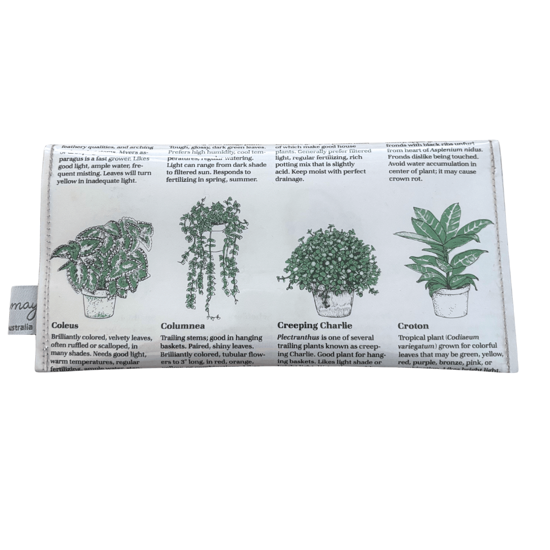 Lyssy May handmade wallet featuring pages from a vintage gardening book. Back view showing indoor plant illustrations.