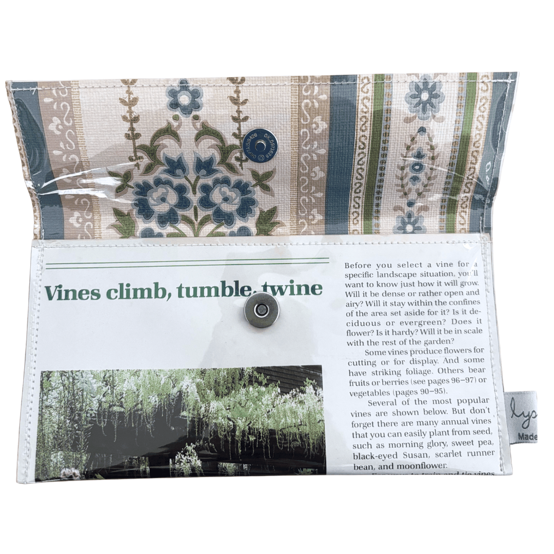 handmade wallet with floral pattern and educational text on a white background