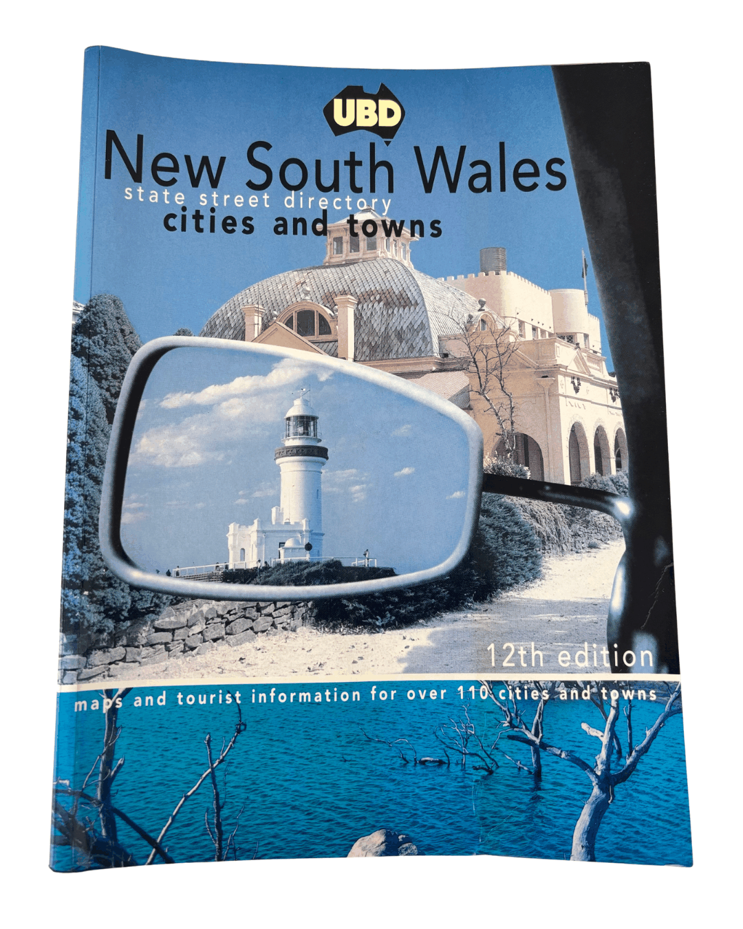 Book cover of UBD New South Wales cities and towns directory with a lighthouse reflection. 12 edition 1998 is used to create Lyssy May wallets from these original pages.