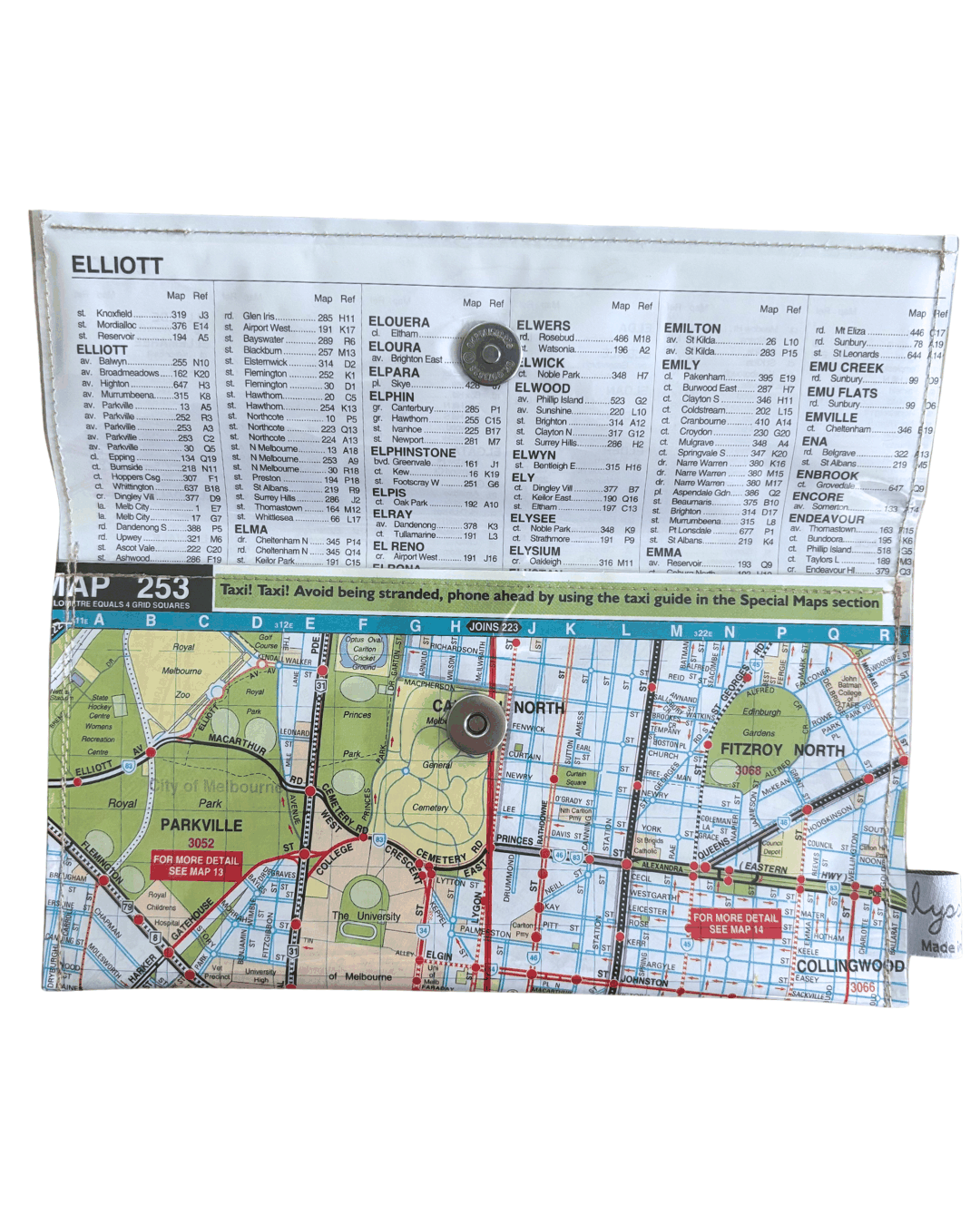 Handmade wallet by lyssymay featuring inner city melbourne suburbs. Inside view showing that the wallet is lined with an index page from the street directory and closes with a magnetic clip.
