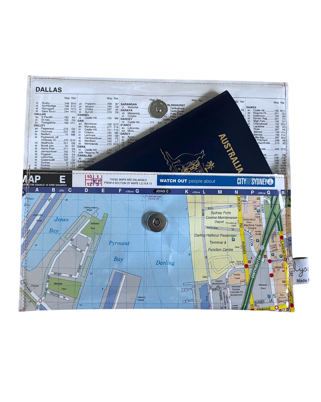 Passport in a Sydney handmade map wallet by lyssymay on a white background