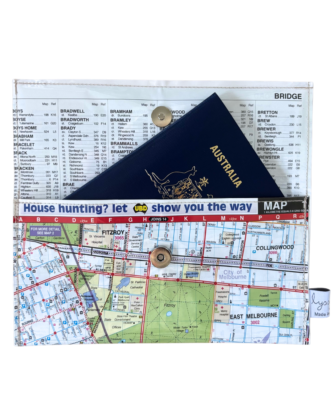 Map of Melbourne with a passport made as a wallet by Lyssy May against a white background