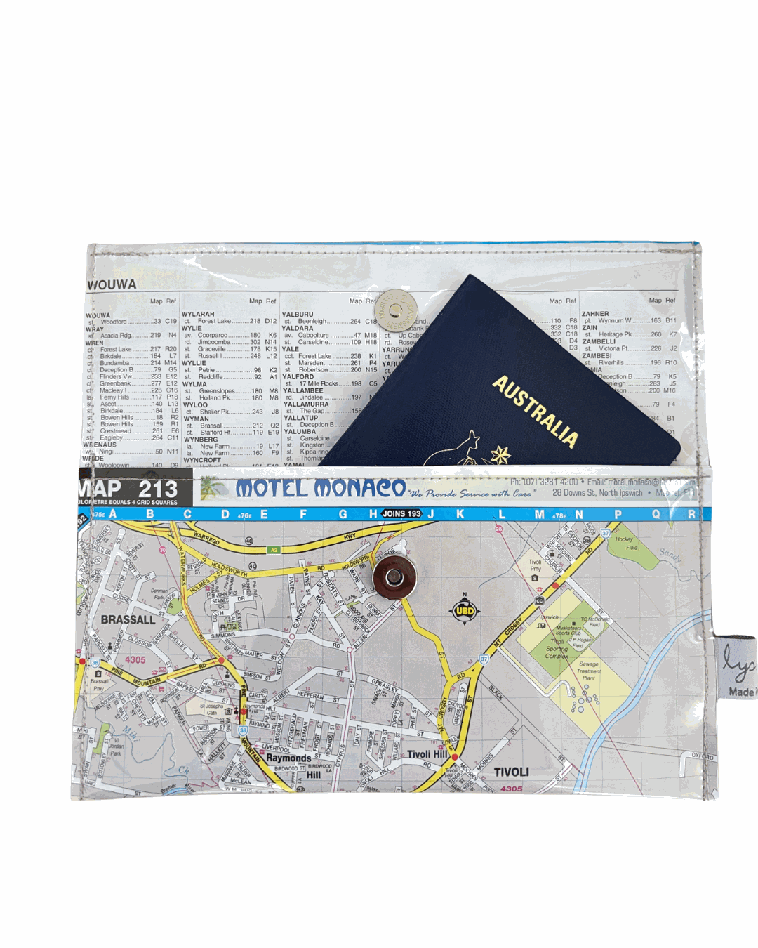 Lyssy May recycled map wallet of Ipswich Queensland suburbs. Inside view of wallet with index page lining and magnetic clip closure. Passport inside the wallet.
