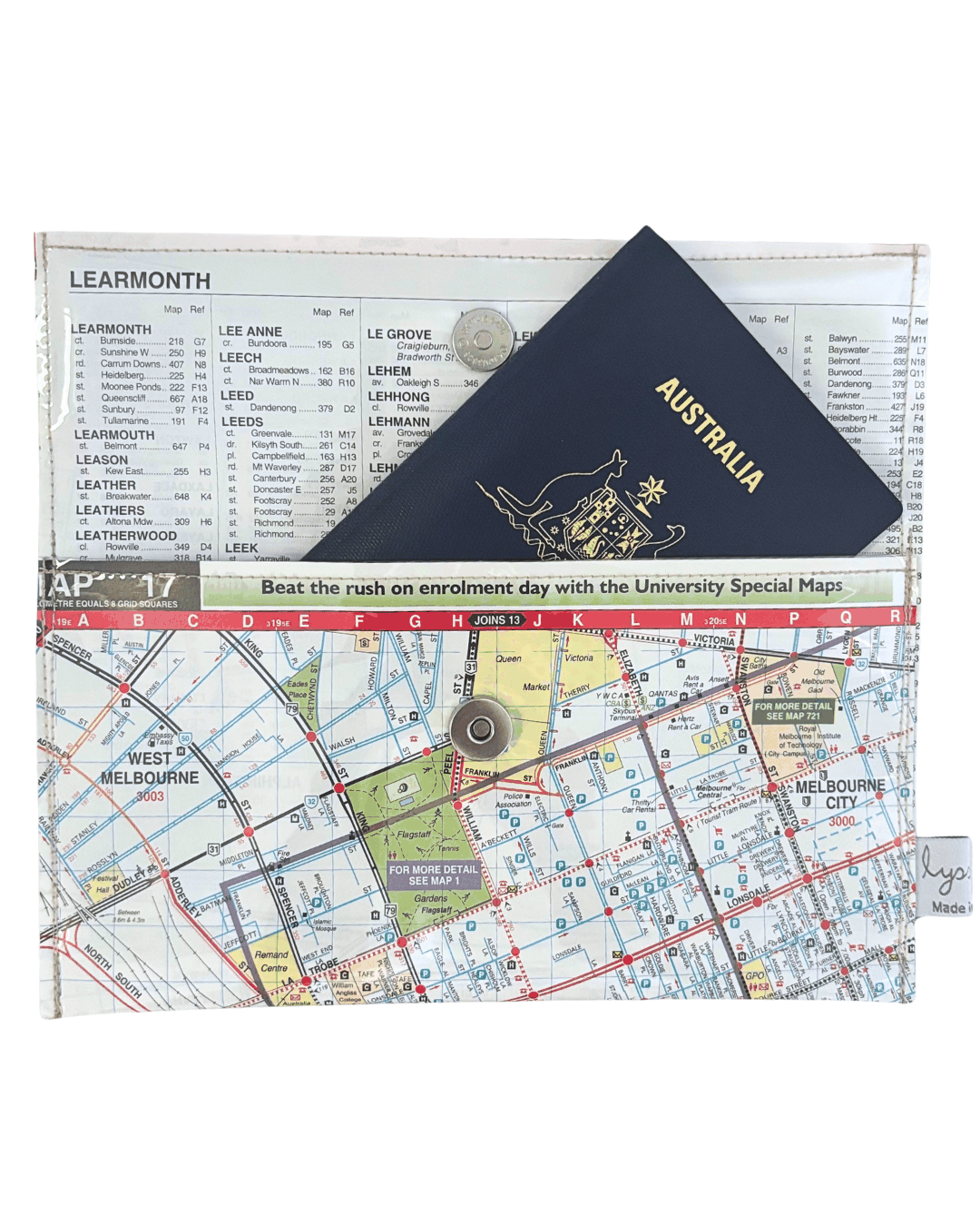 Recycled Street Map Wallet featuring Melbourne city map with Yarra River, Spencer Street Station, and Southbank details. inside view of wallet with passport inside.