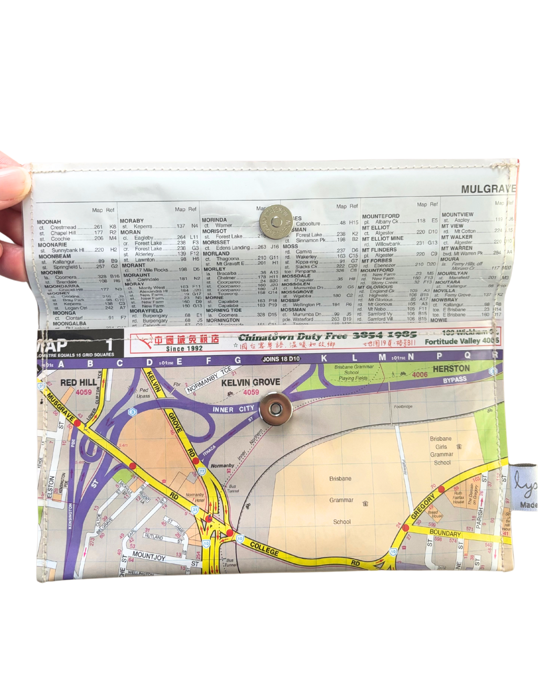 Map pouch with a printed map design on a white background
