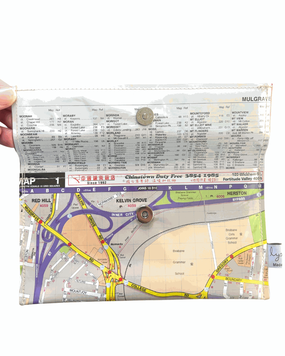 Map pouch with a printed map design on a white background