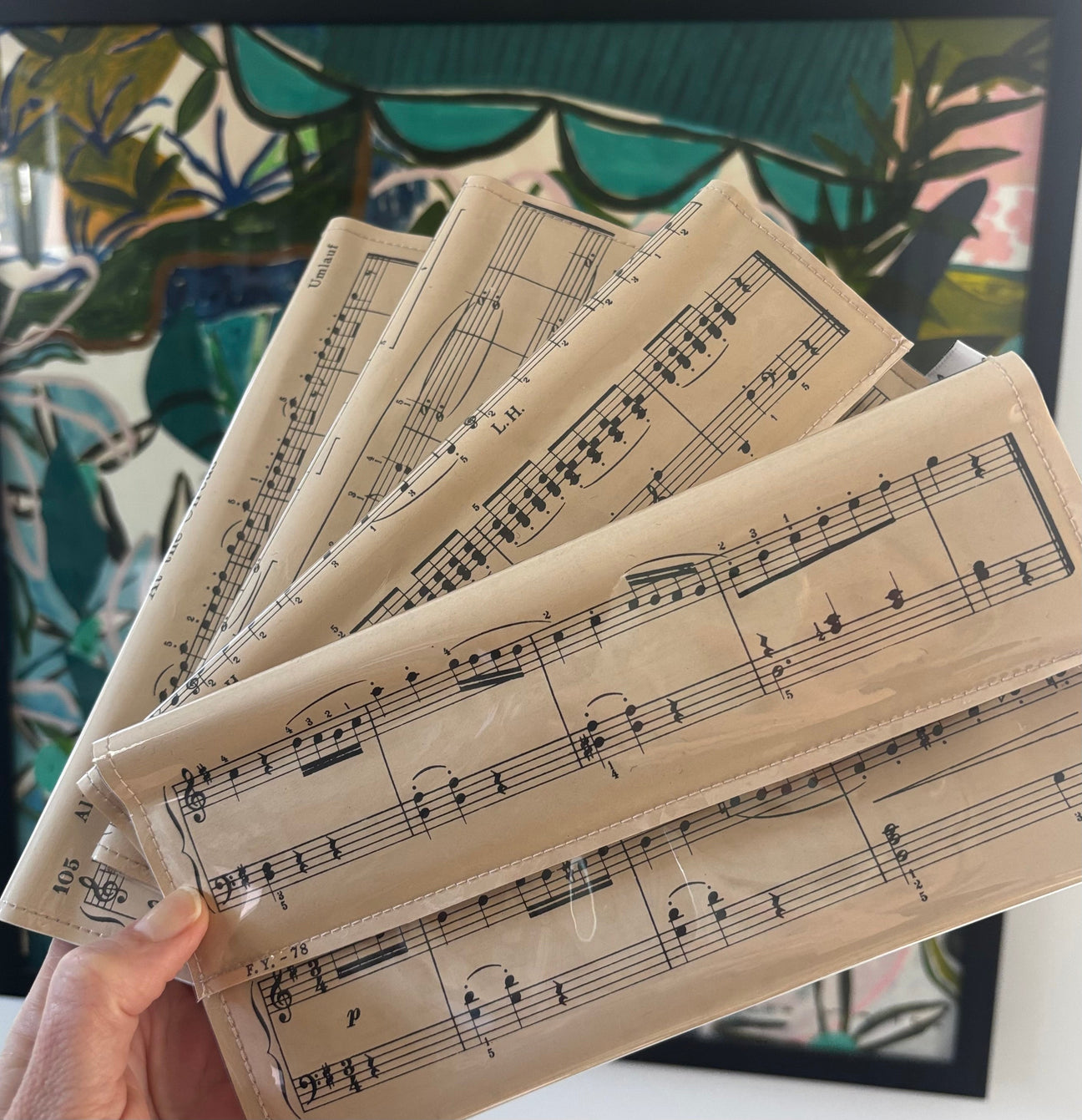 Vintage book titled 'First Year at the Piano' by John M. Williams on a white background used to create Lyssy May's sheet music wallet with example of page