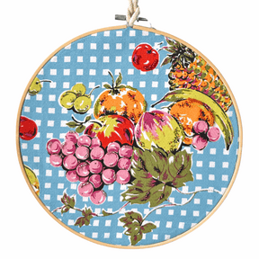 Retro kitchen fruit bowl wall hanging with vintage tea towel and glass bead embellishments in bamboo hoop