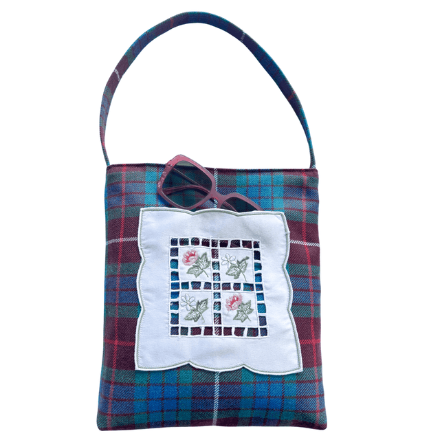 Vintage fabric shopper bag in Clan Fraser tartan with embroidered floral doily pocket and shoulder strap