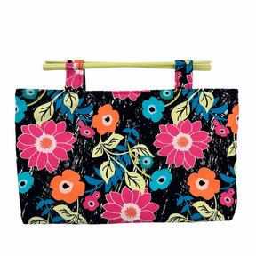 Party in the Jungle floral cotton clutch bag with pastel yellow resin chopstick handles and magnetic clasp closure
