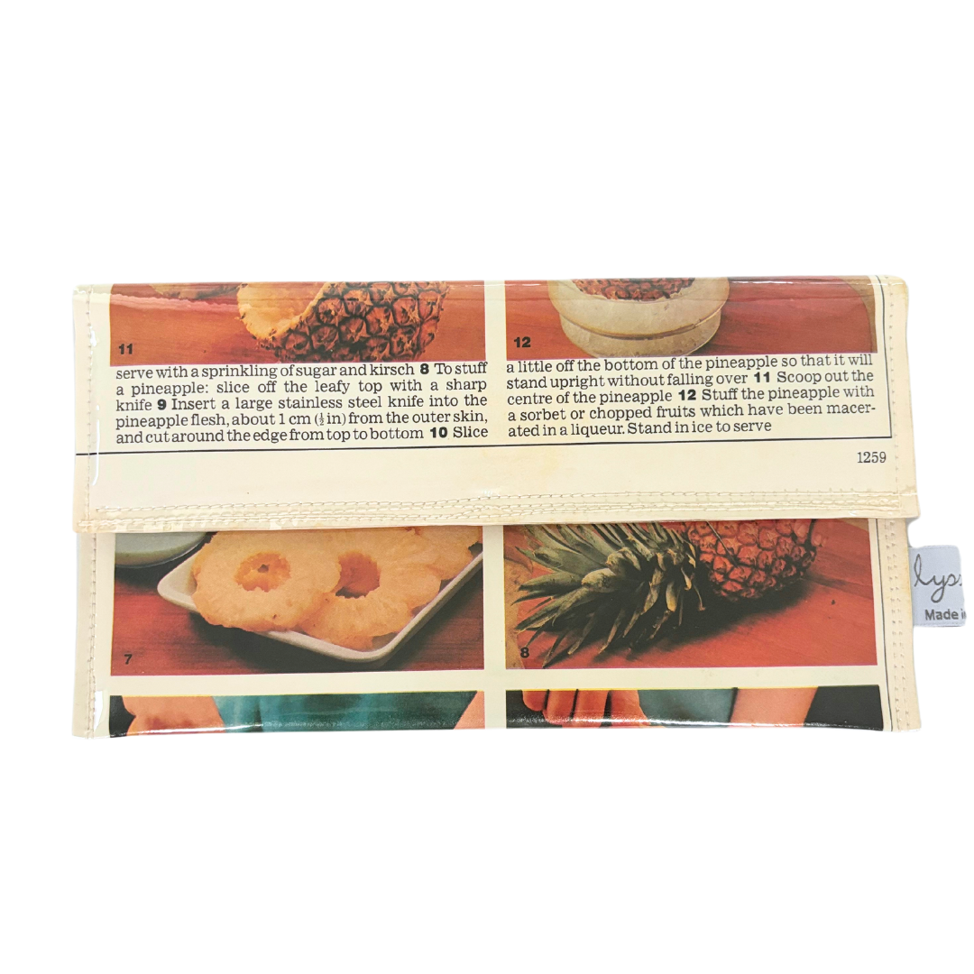 handmade wallet featuring original pages of a retro recipe book featuring pineappples