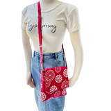 Handmade Cross Body Bag with adjustable strap that is perfect as a bag to travel overseas to hold your passport and other essentials. This floral fabric design is lightweight and has been treated with fabric protector.