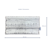 Dimensions of a handmade wallet with musical notation design on a white background