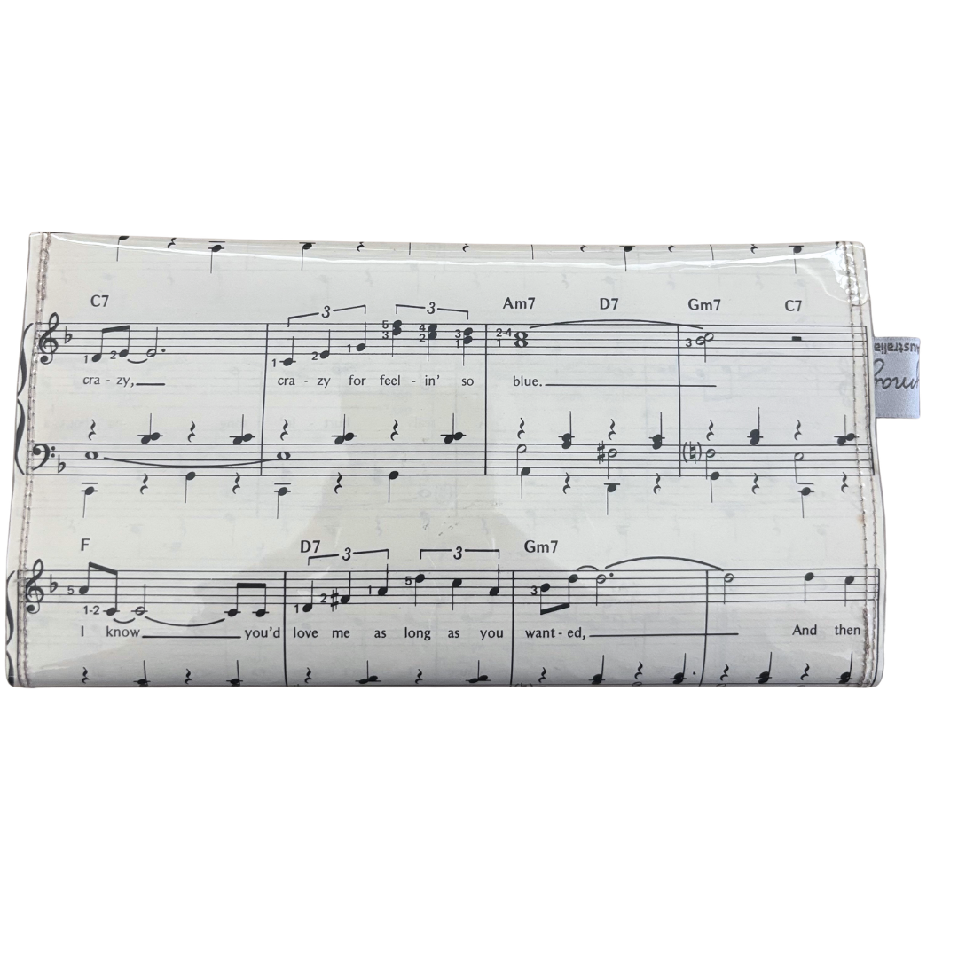 handmade wallet music sheet design on a white background