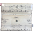 Wallet made from with music sheet design and 'Crazy' text on a white background