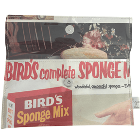 Vintage 1950s magazine wallet featuring Bird's Sponge Cake Mix advertisement and magnetic closure