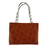Handcrafted Japanese cotton/linen shoulder bag – back view showing burnt toffee polka dot panel and woven chevron strap – Lyssy May