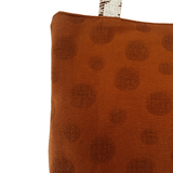 Close-up of Japanese cotton/linen jacquard weave fabric with black and white chevron pattern on handcrafted shoulder bag – Lyssy May