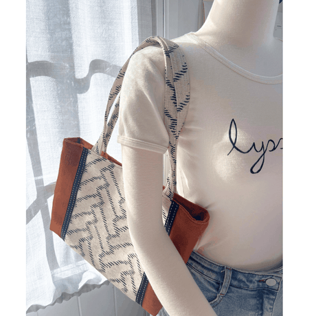Burnt Caramel Noir La Pieuvre Tote made from Japanese cotton linen with polka dots and Italian fabric panel detail