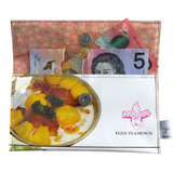 handmade wallet with a design of eggs flamenco, money, and a brand logo.