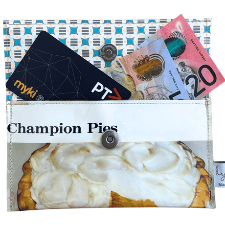 Retro Recipe Wallet made from 1960s cookbook pages featuring Champion Pies design with vintage geometric lining and magnetic clasp.
