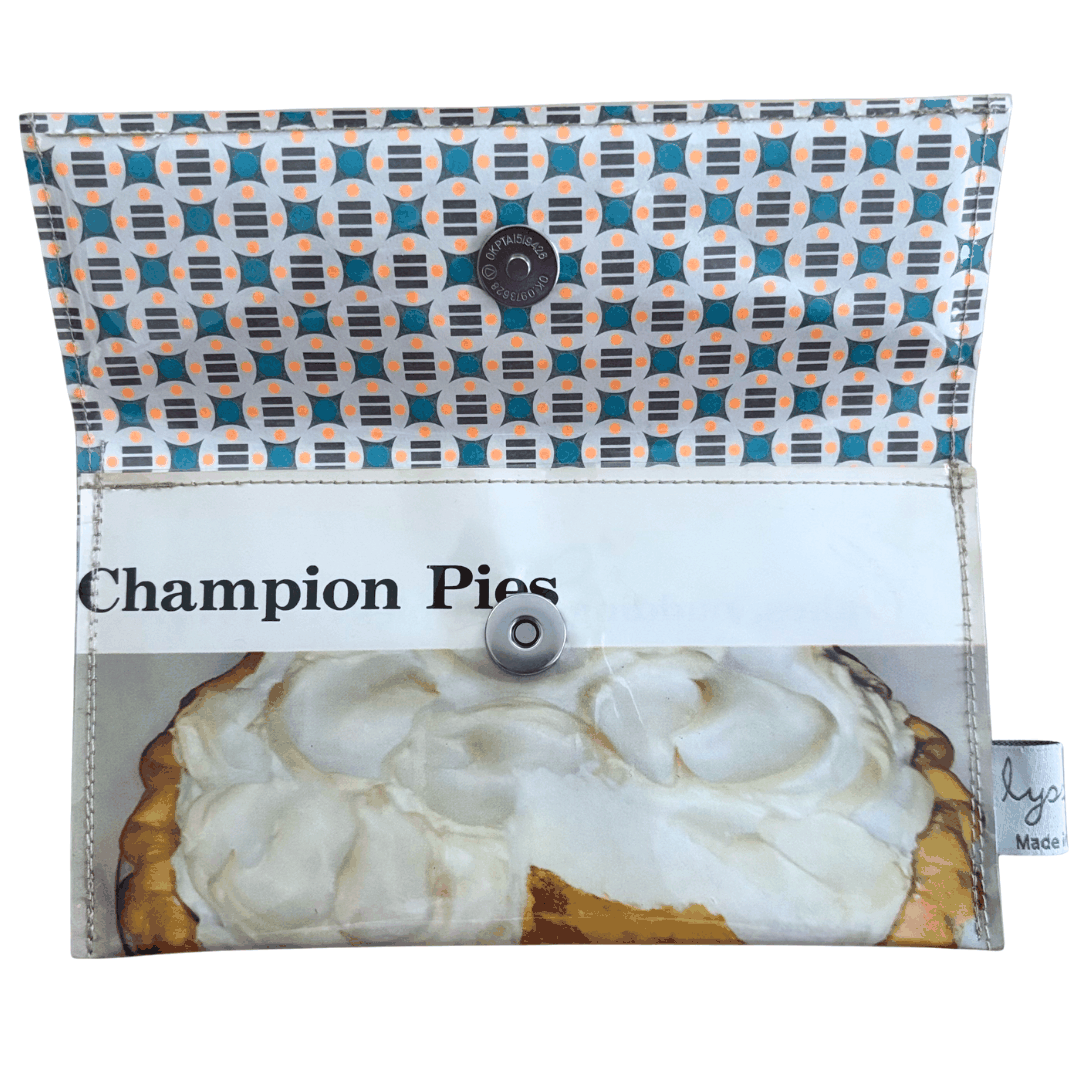 Lyssy May handmade wallet from Golden Circle tropical recipe book with Champion Pies headline. Inside lining with geometric patterned paper.