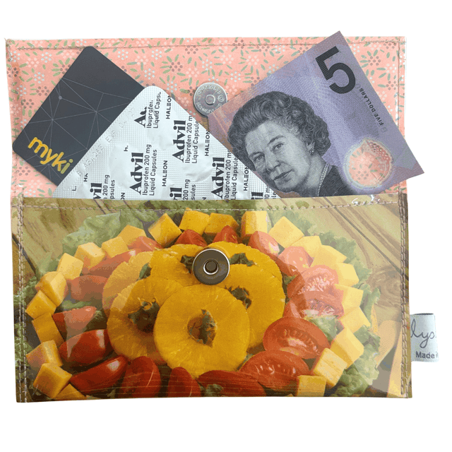 Lyssy May handmade wallet featuring original page from Golden Circle Cookbook from the 1960s. This shows the wallet open and that it fits an Australian $5 note, headache medication and credit car.