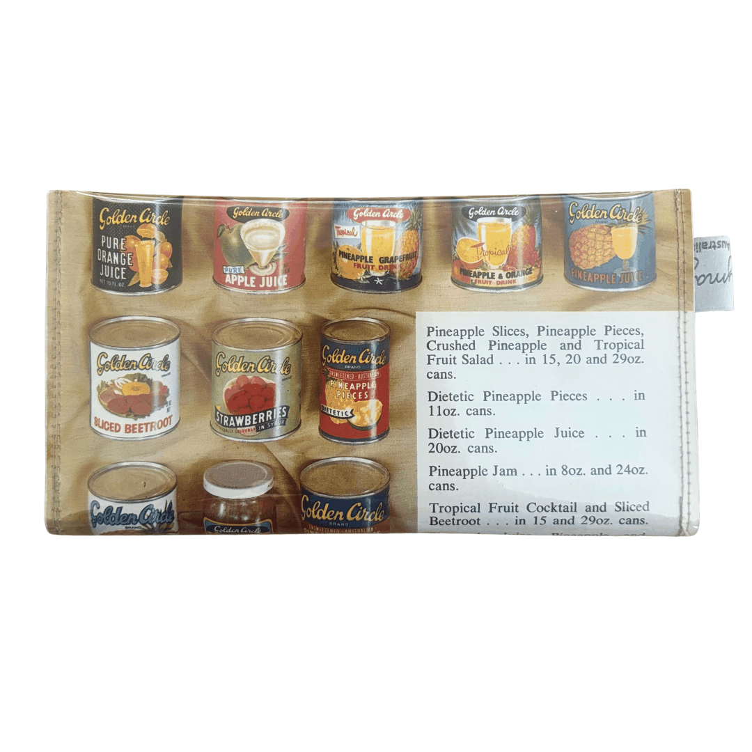 Collection of Golden Girl pineapple products in a display box on a white background on the back of a handmade wallet by lyssymay