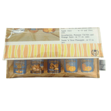 Slimline retro recipe wallet made from 1960s Golden Circle Tropical Cook Book pages with vintage floral lining and magnetic clasp