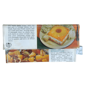 Retro recipe wallet made from 1960s Golden Circle Tropical Cookbook pages with magnetic clasp and green retro lining