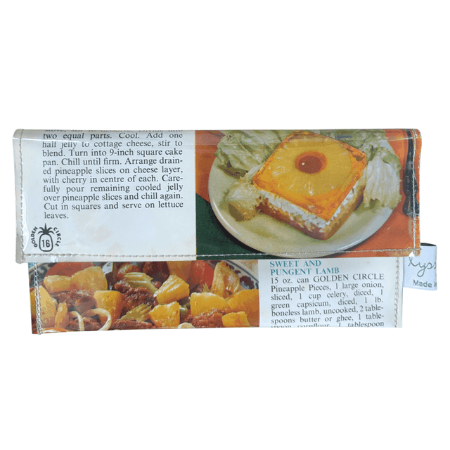 Retro recipe wallet made from 1960s Golden Circle Tropical Cookbook pages with magnetic clasp and green retro lining