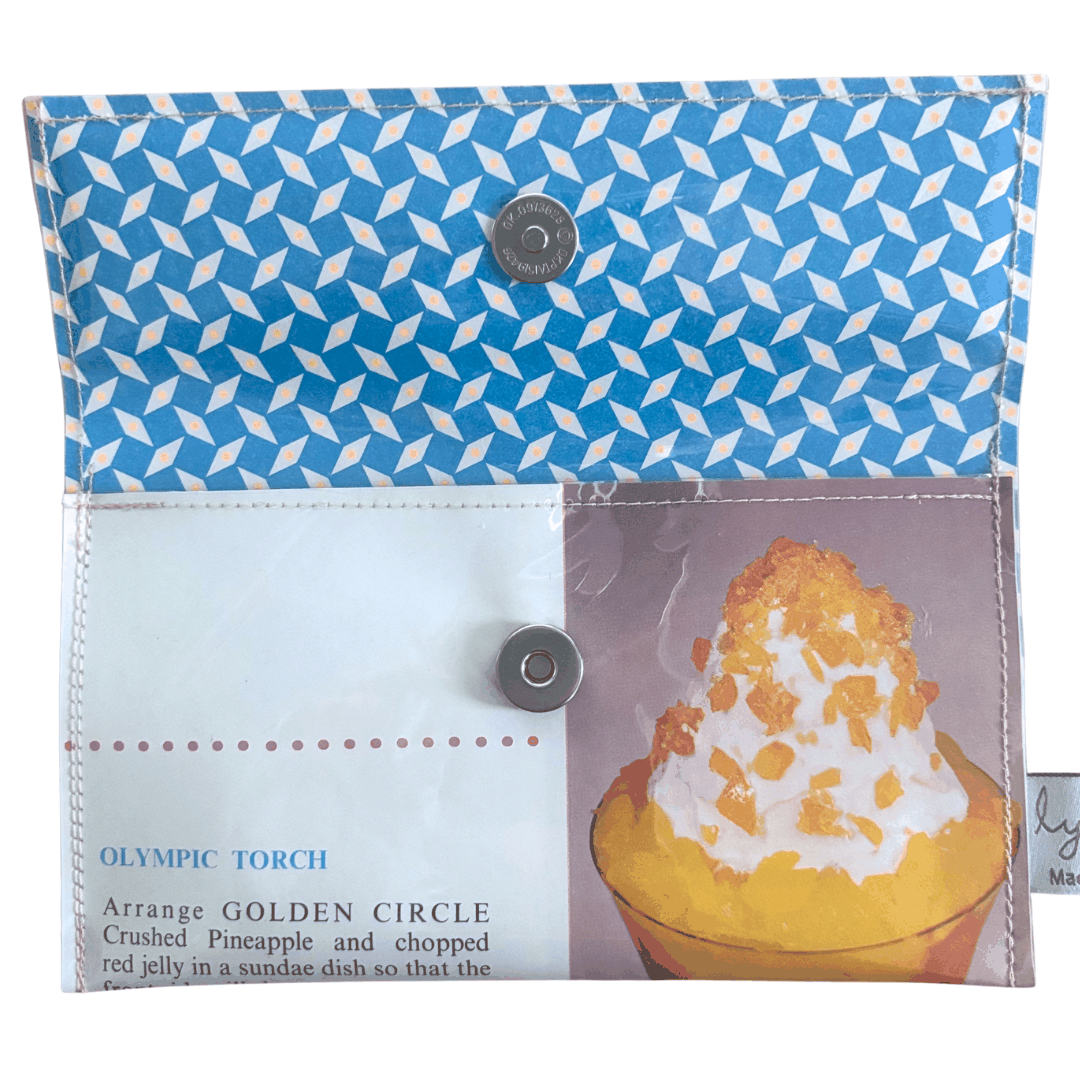 LyssyMay handmade wallet created from Tropical Golden Circle vintage cookbook. Inside view showing magnetic clip.