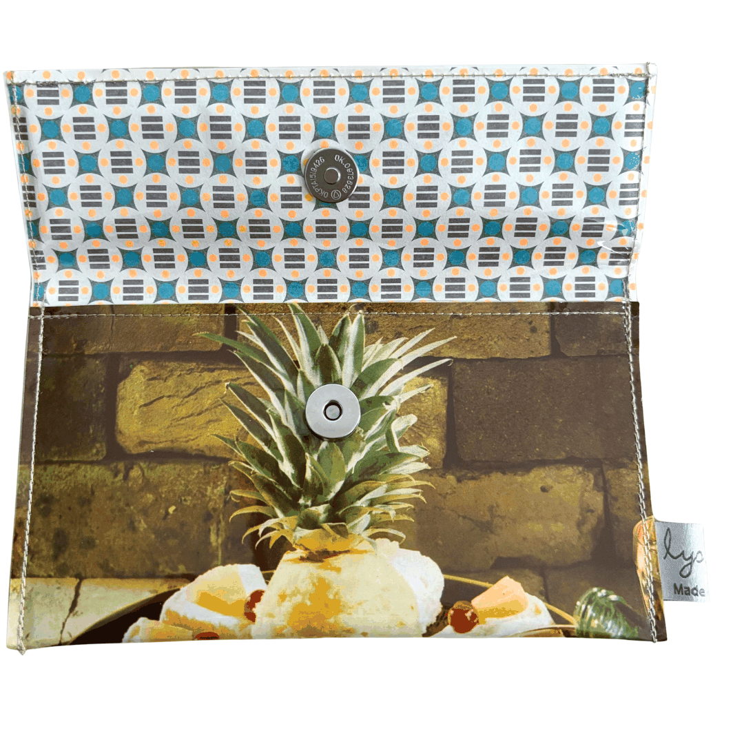 Retro Recipe Wallet made from 1960s Pineapple Cheese Cake cookbook pages with vintage geometric lining and magnetic clasp