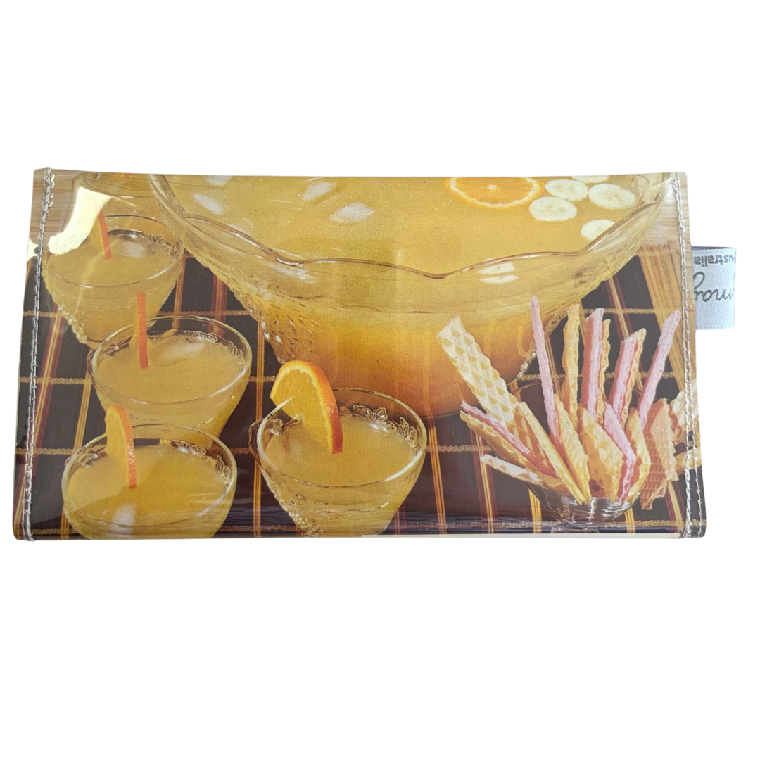 Punch bowl with a printed design of drinks and snacks on a white background