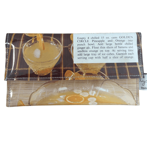 Handcrafted retro recipe wallet made from 1960s Golden Circle Tropical Punch cookbook pages with vintage punch bowl design and geometric lining