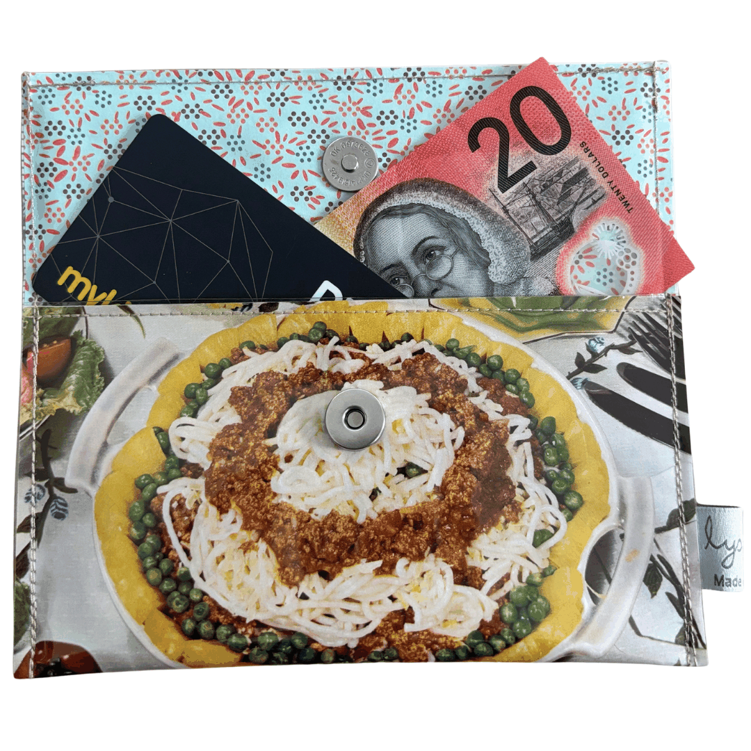 Retro Recipe Wallet made from 1960s Tropical Spaghetti and Sea-Scallop Casserole cookbook pages with floral lining and magnetic clasp