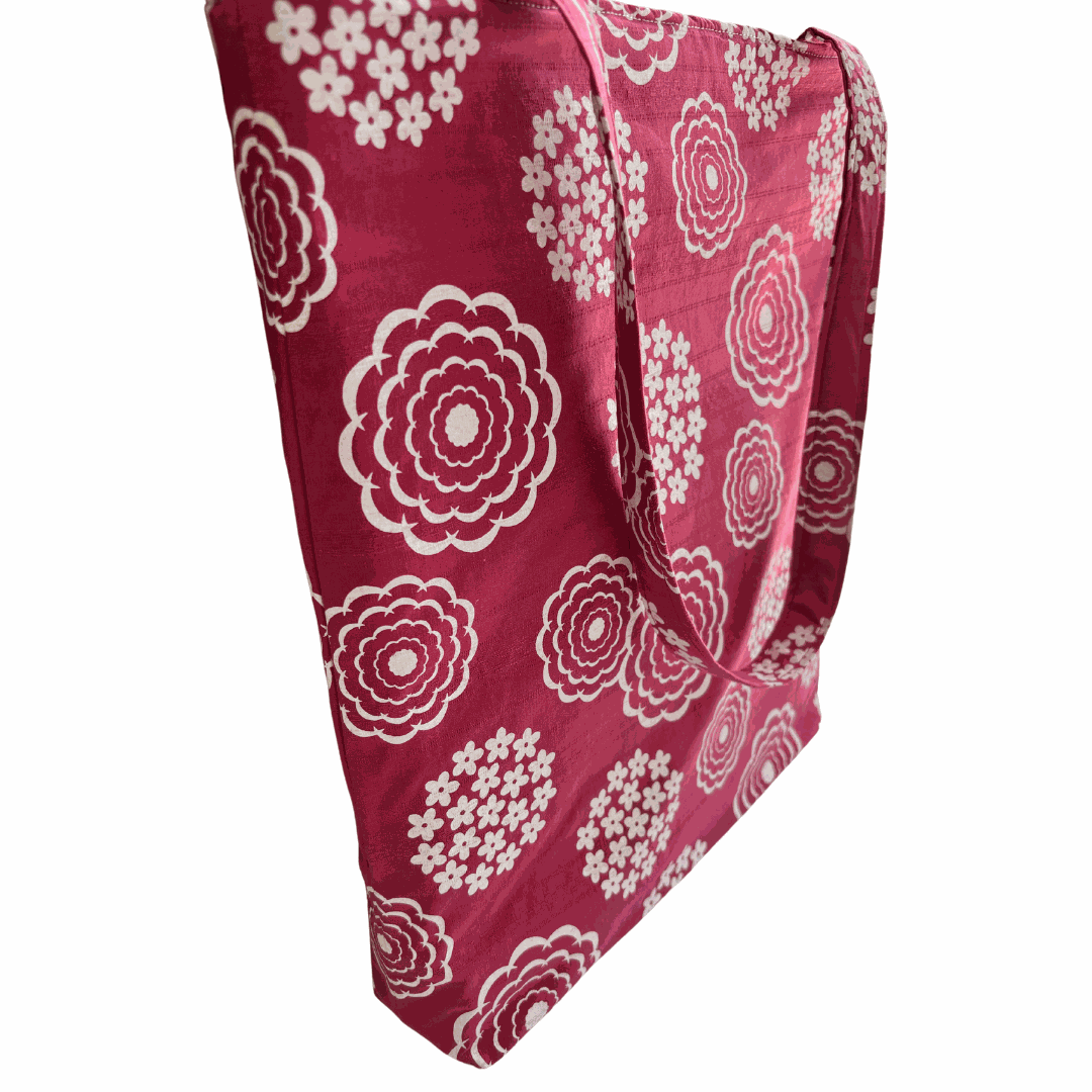 LyssyMay handprinted tote white floral patterns on a white background