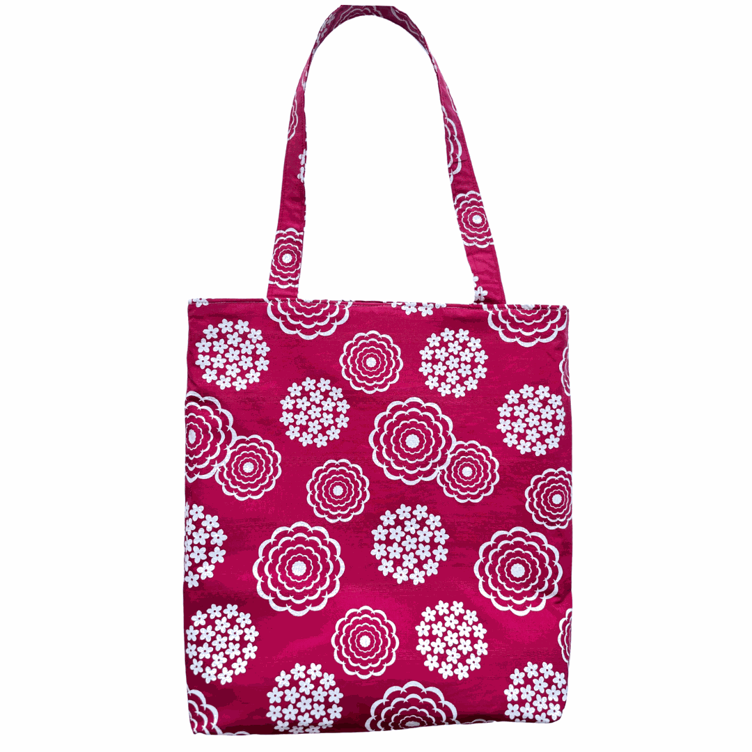 LyssyMay handprinted Tote bag with white floral pattern on a pink background