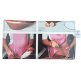 Handmade wallet with images of a person cooking, featuring a pink apron on the back of the design.